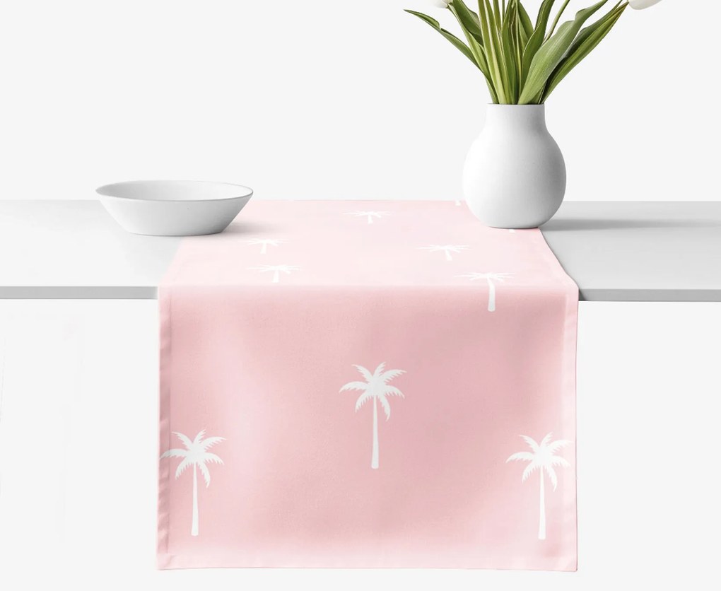 Goldea pamut asztali futó - pálmák pasztell rózsaszín alapon 50x120 cm