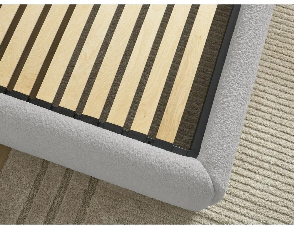 Világosszürke kárpitozott ágyneműtartós-ágytámla nélkül franciaágy ágyráccsal 180x200 cm Inera – Bobochic Paris