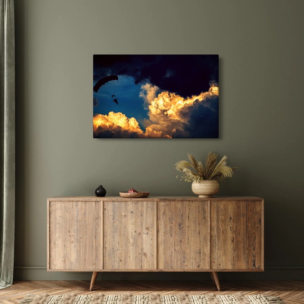 Ejtőernyős a felhőkben képe (90x60 cm)