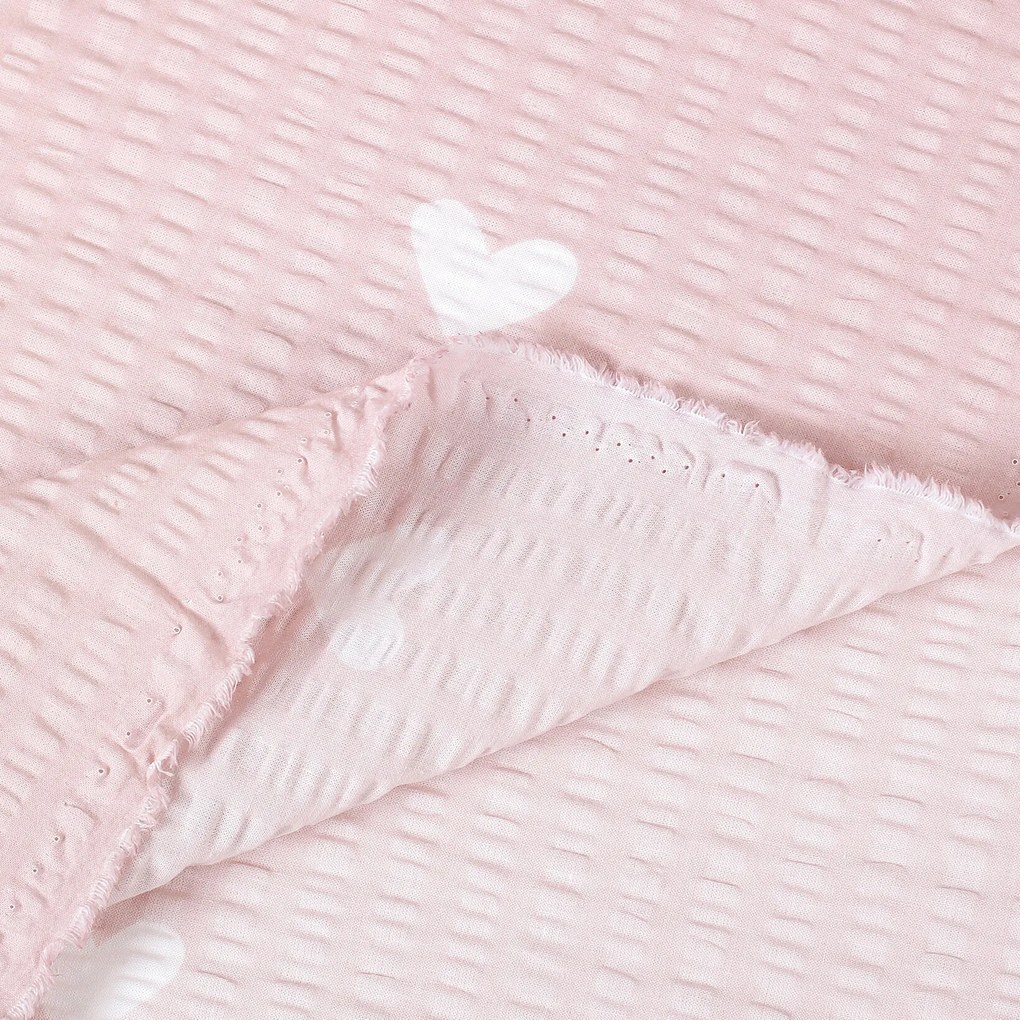 Goldea pamut krepp anyag - szívecskék, púderrózsaszín alapon 160 cm