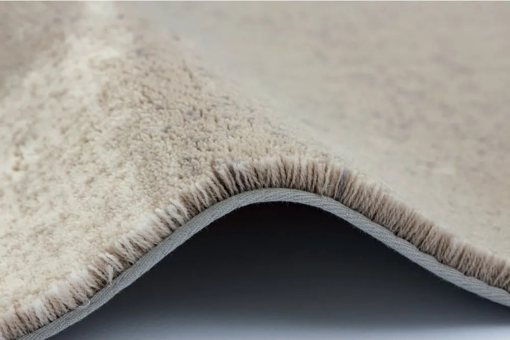 Szürkésbézs gyapjú szőnyeg 133x190 cm Agnus Pavement – Agnella