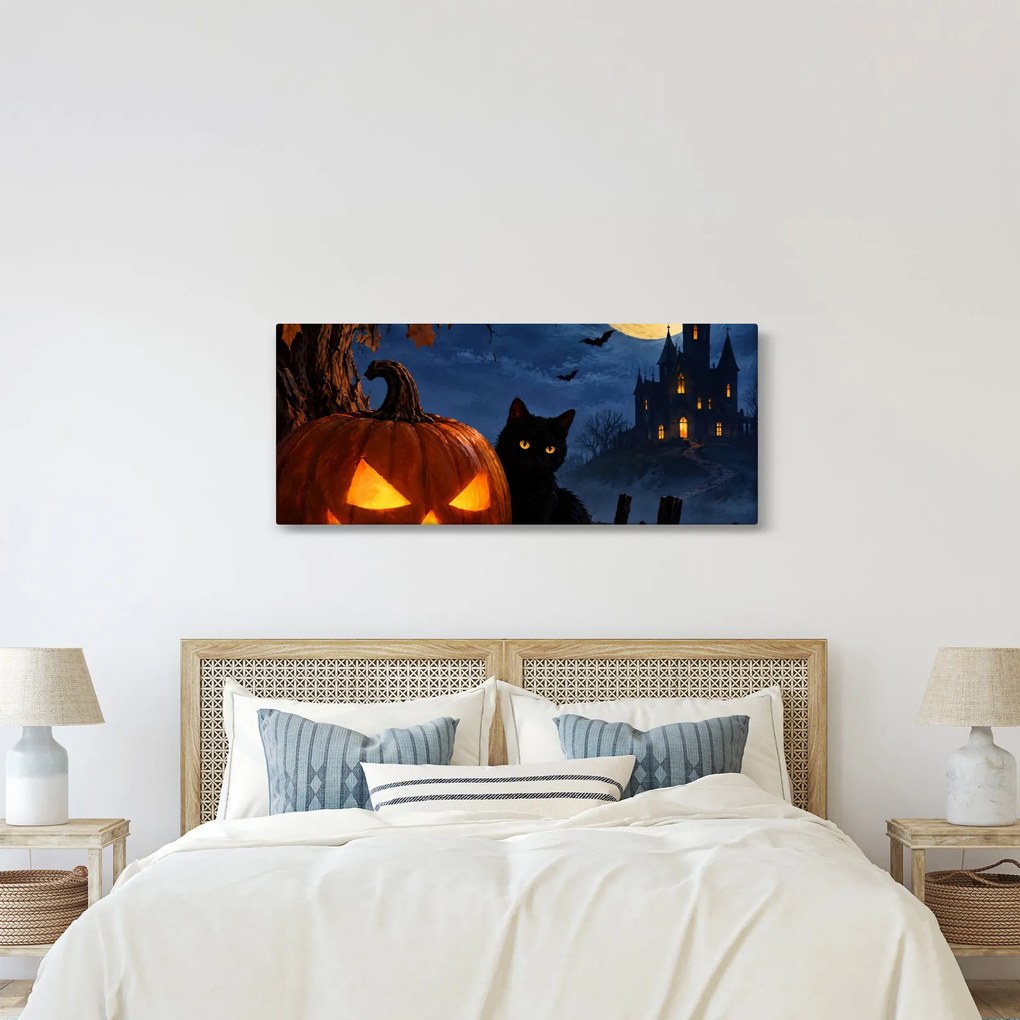 Kép - Fekete macska egy világító halloweeni tök mellett (120x50 cm)