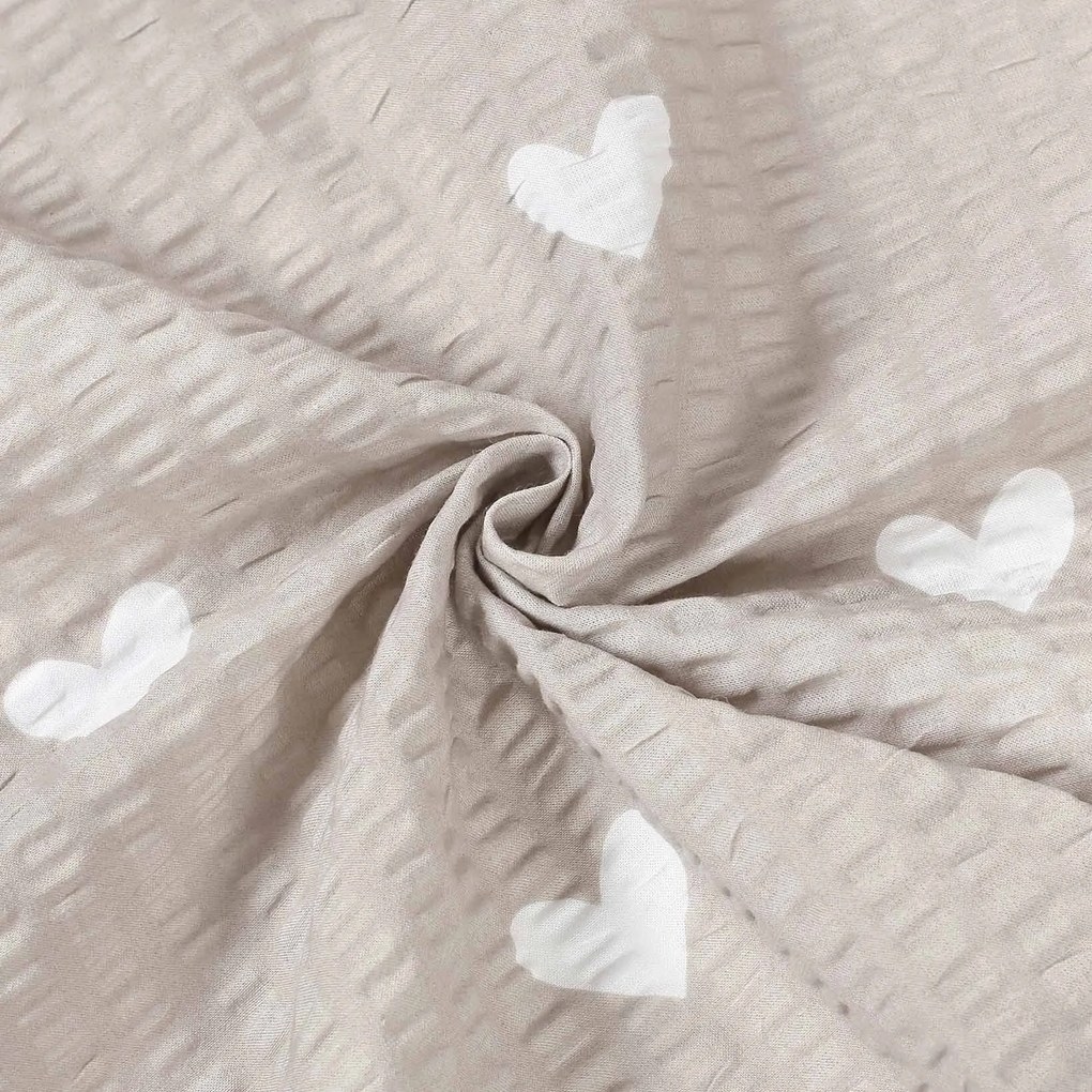 Goldea pamut krepp anyag - szívecskék, latté színű alapon 160 cm