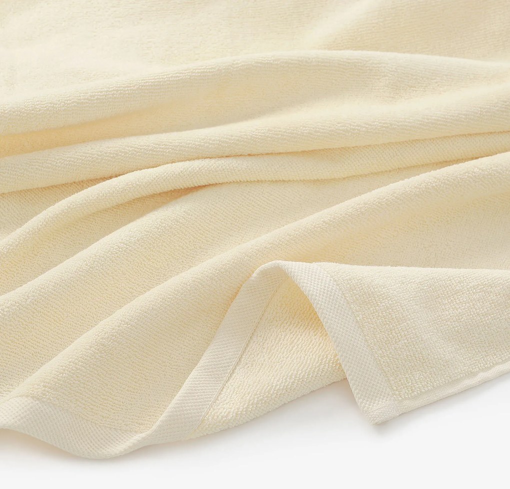 Goldea bordűr nélküli frottír törölköző és fürdőlepedő soft – krémszínű 70 x 140 cm