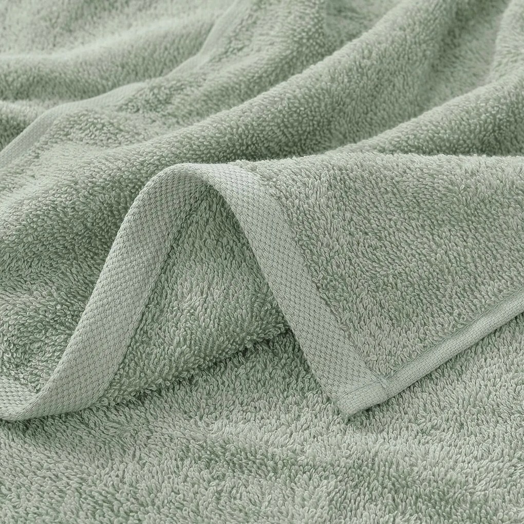 Goldea gyermek frottír törölköző - zsiráf zsályaszínű alapon 30 x 50 cm