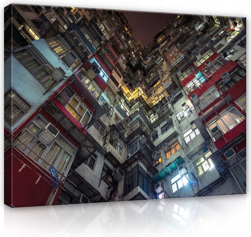 Vászonkép 100x75 Városi sűrűség épület ablak magasság fény éjszaka építészet