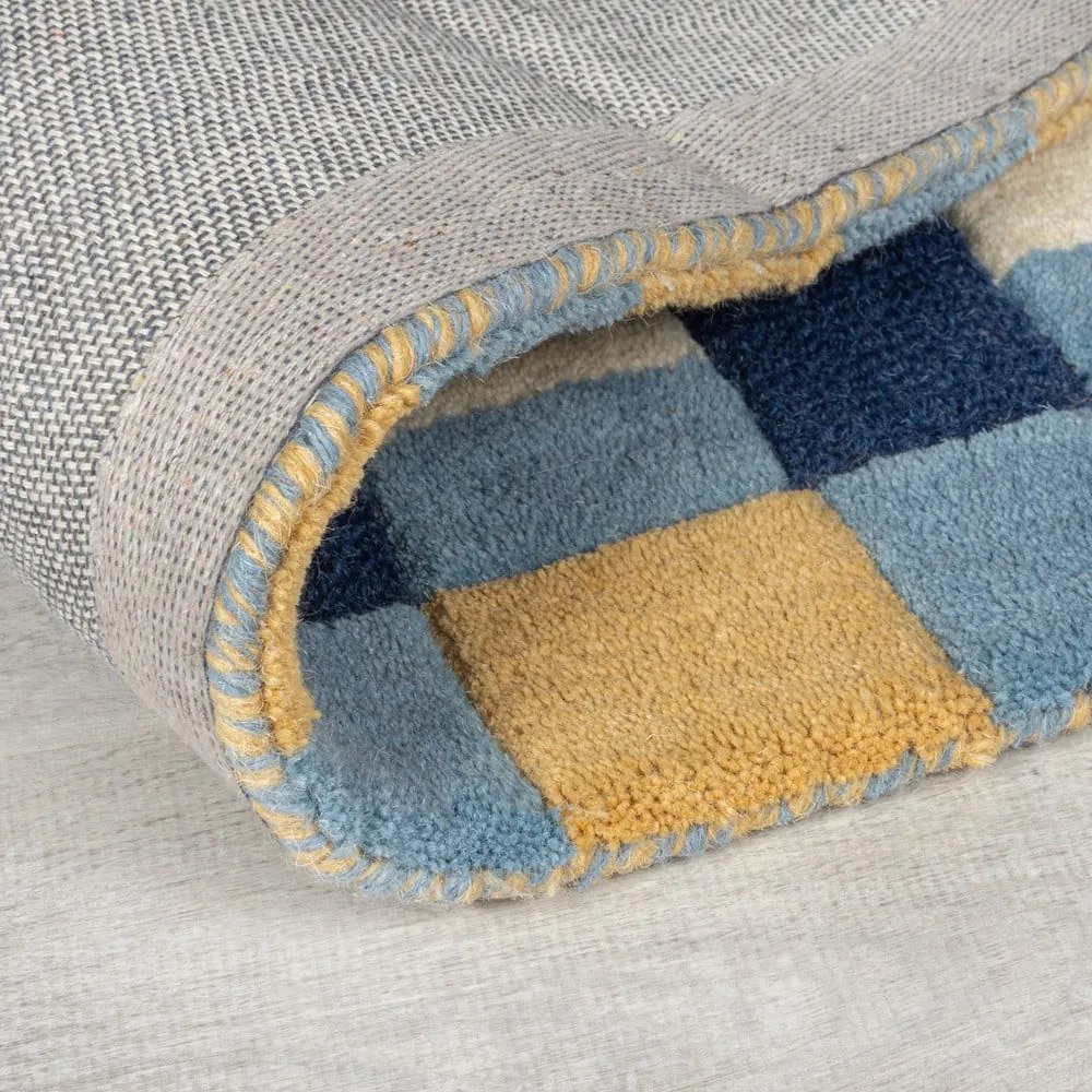 Kék kézi szövésű gyapjú szőnyeg 120x170 cm Kai Wool Border – Flair Rugs