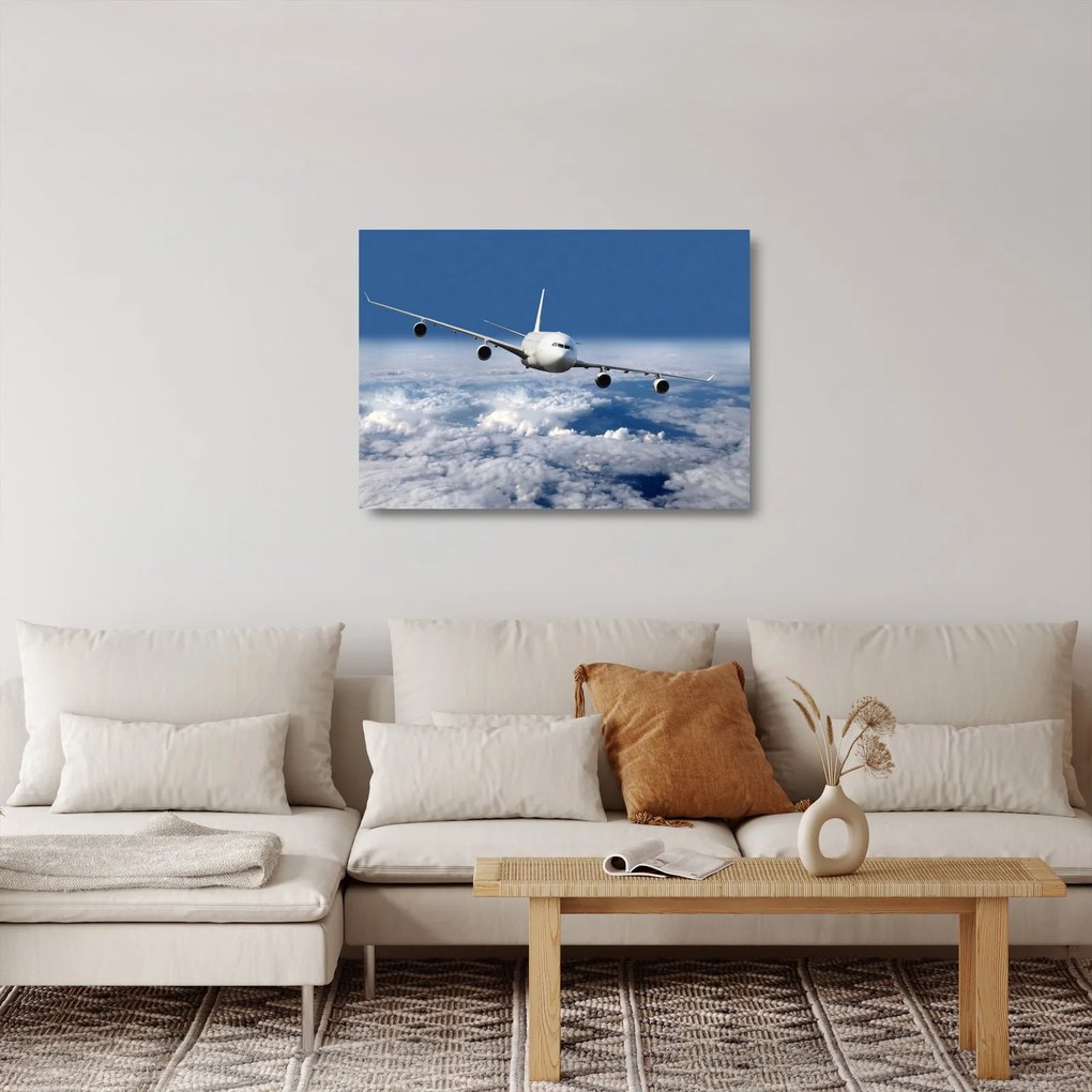 Üveg kép - Repülőgép a felhőkben (70x50 cm)