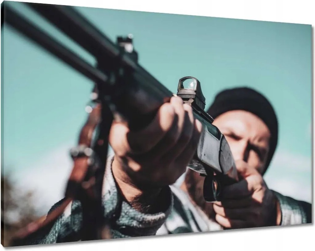 Vászonkép 100x70 Vadász puskával