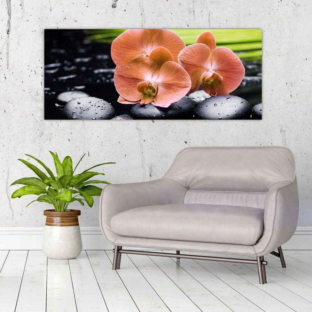 Kép - Narancssárga orchidea pálmalevelekkel (120x50 cm)