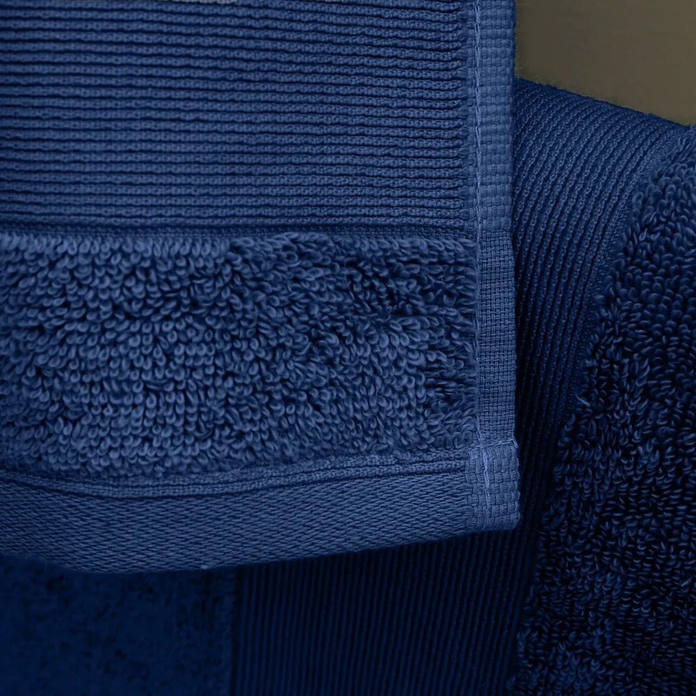 Sötétkék frottír pamut fürdőlepedő szett 2 db-os 90x140 cm Anti-Bacterial – Catherine Lansfield