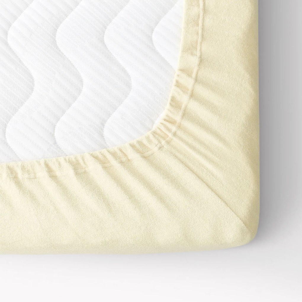 Goldea frottír gumis lepedő - világossárga 180 x 200 cm