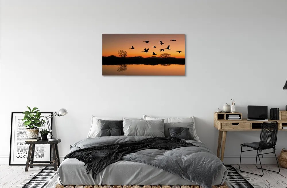 Canvas képek Repülő madarak naplemente 120x60 cm