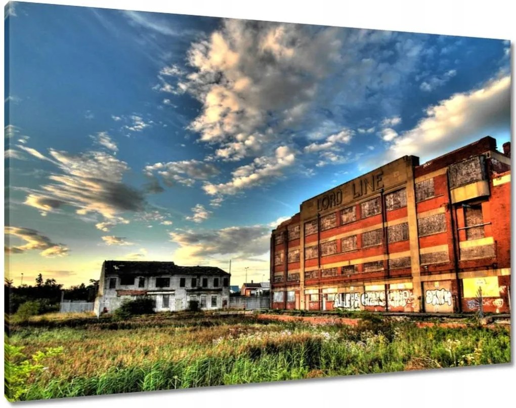 Vászonkép 100x70 Felhők az épületek felett