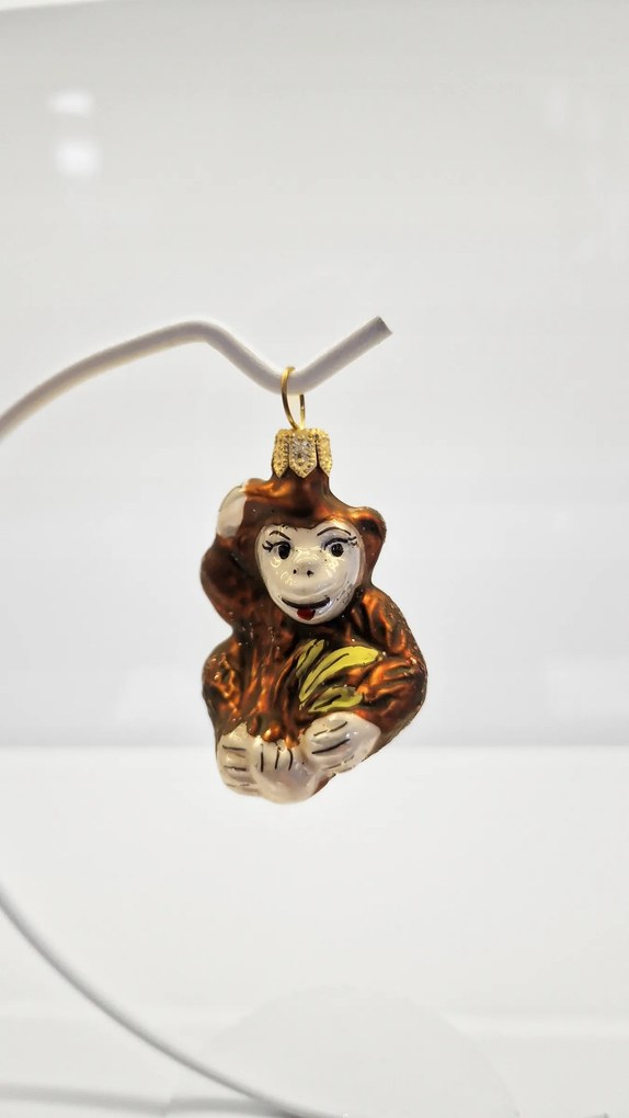 Karácsonyfa gömb üveg majom forma banánnal