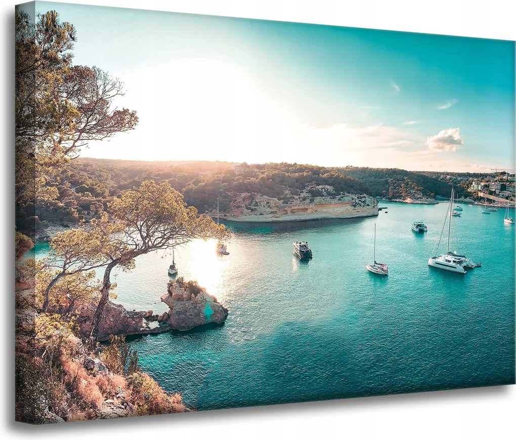 Vászonkép Víz a nap tükrében Csónakok Sziklák 70x50 cm