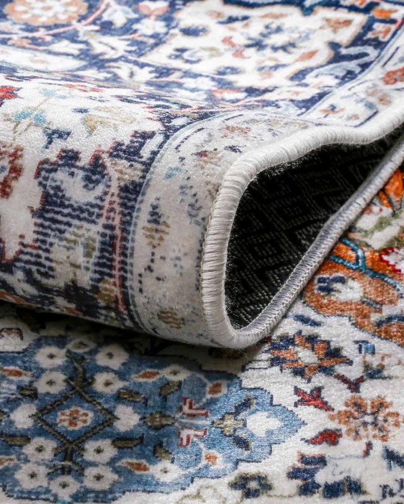 Carpetum bézs alapon, piros mintás szőnyeg 100x150