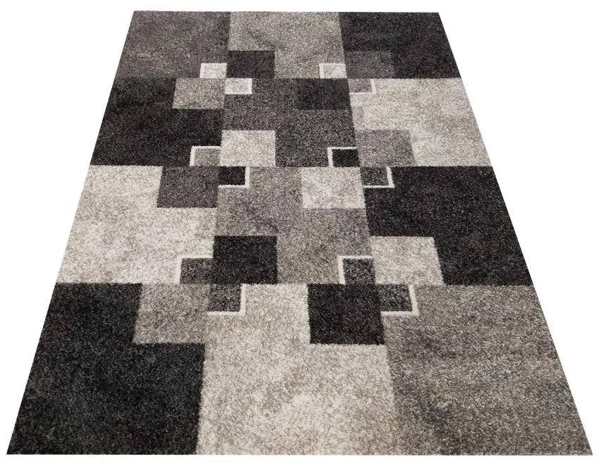 Egyedi bézs szőnyeg négyzet motívummal Szélesség: 120 cm | Hossz: 170 cm
