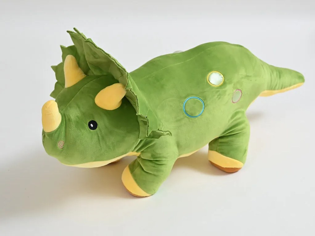 Plüss DÍNÓ zöld babatakaróval belül