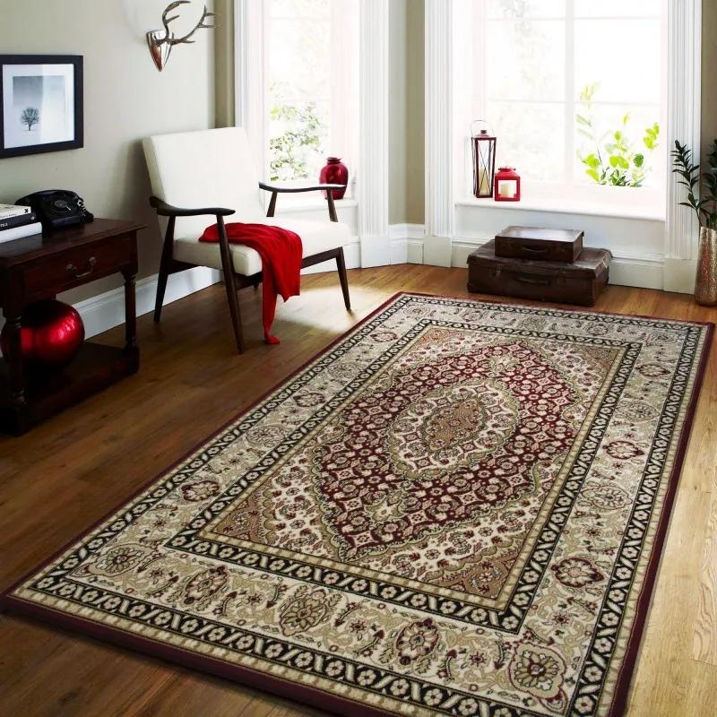 Vintage szőnyeg piros színben krém mintákkal Szélesség: 160 cm | Hossz: 220 cm