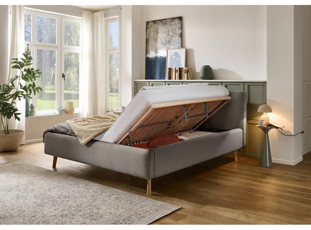 Szürke kárpitozott ágyneműtartós franciaágy ágyráccsal 160x200 cm Mattis – Meise Möbel