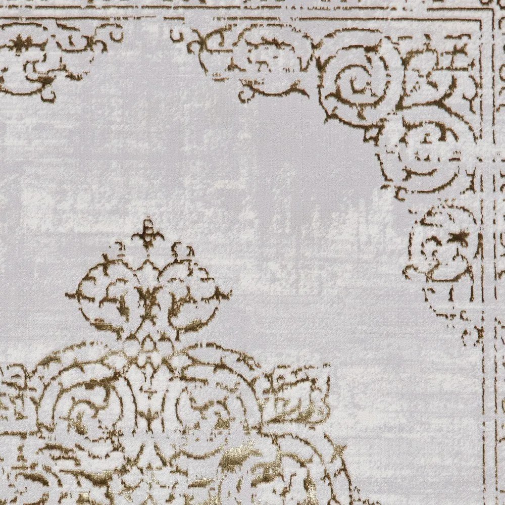 Világosszürke-aranyszínű szőnyeg 120x170 cm Artemis – Think Rugs