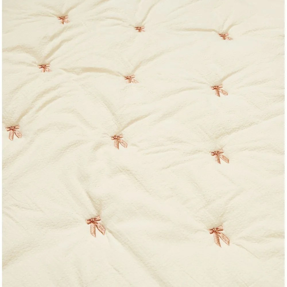 Világossárga-rózsaszín bio pamut steppelt gyerek takaró 90x120 cm Bows – Cam Cam Copenhagen