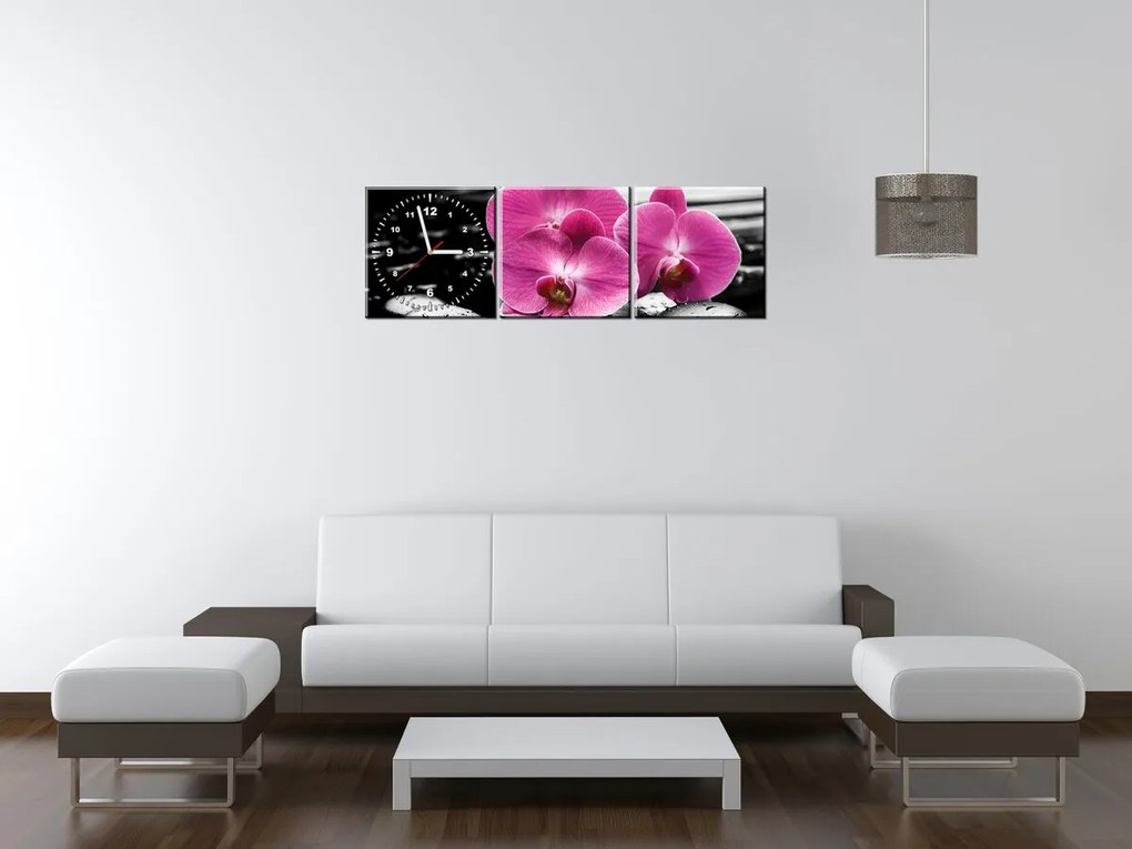 Gario Órás falikép Gyönyöru orchidea o kövek közott - 3 részes Méret: 80 x 40 cm