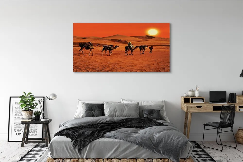Canvas képek Tevék az emberek sivatagi nap ég 125x50 cm