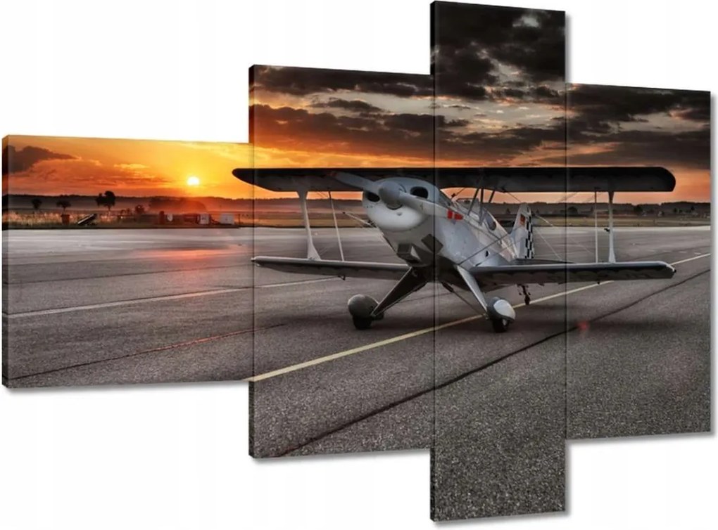 Vászonkép 100x70 Repülőgép naplemente