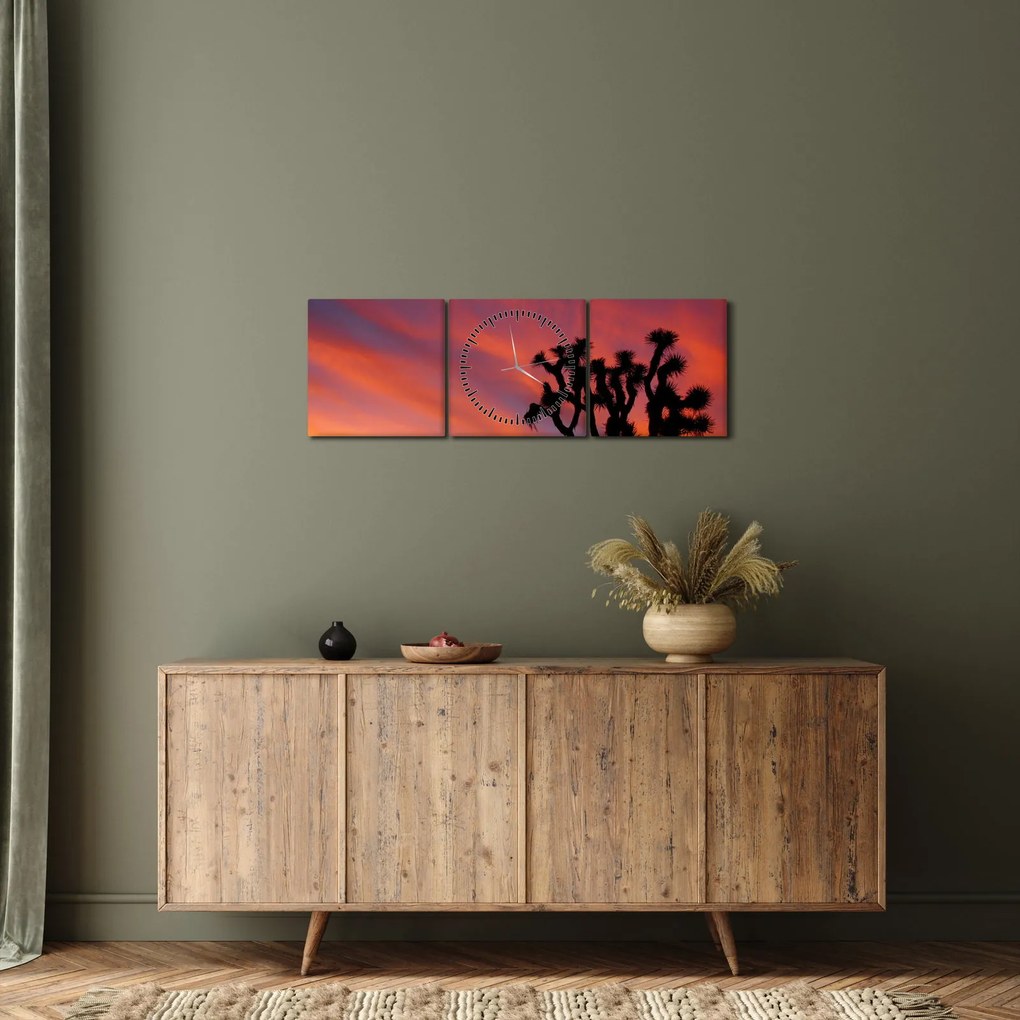 Vászonkép - Naplemente egy fa sziluettje felett (órával) (90x30 cm)
