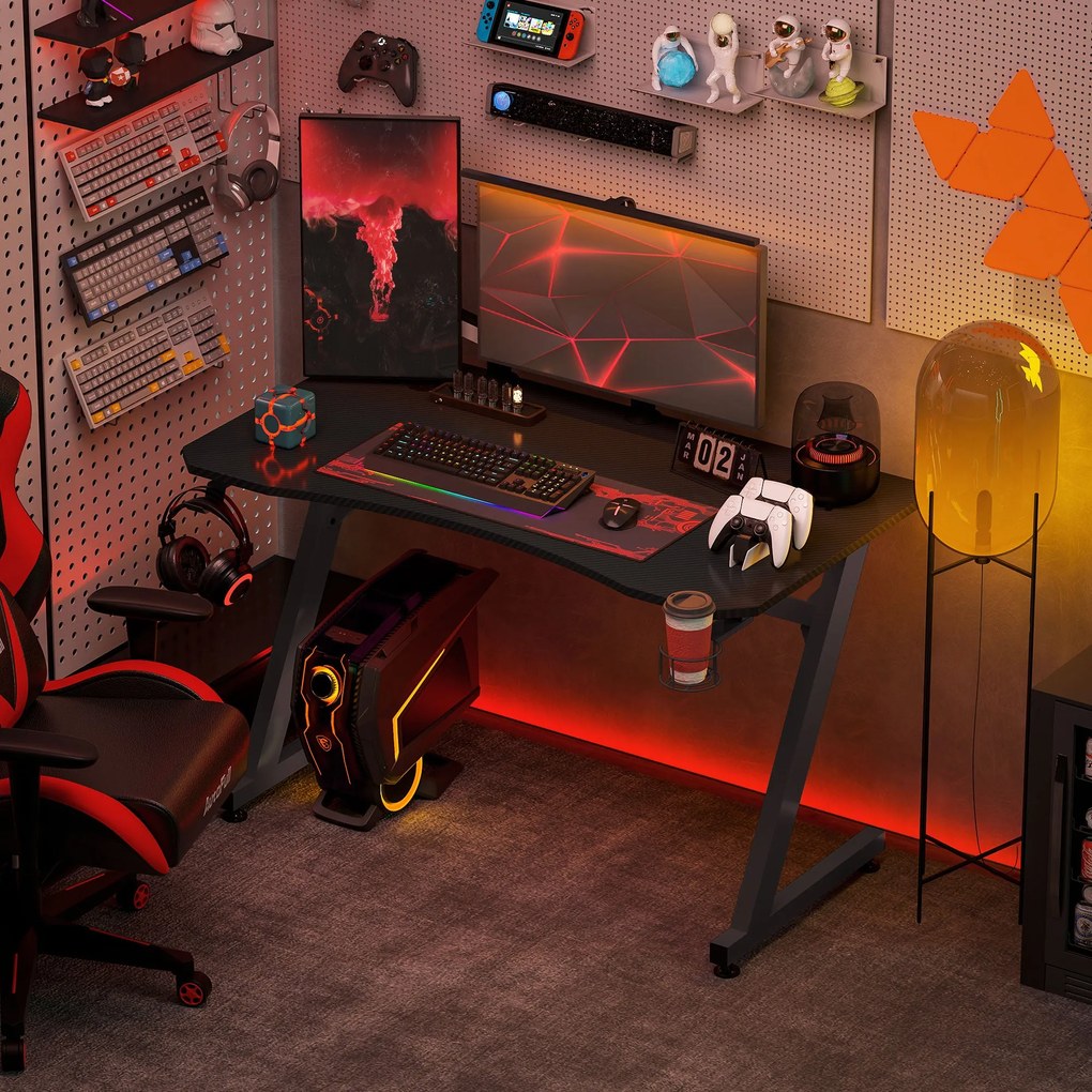 HOMCOM Ergonomikus Játékasztal 120x65x74,5 cm PC Számítógéphez, Pohártartóval, Fejhallgató Akasztóval és Állítható Lábakkal, Szénszálas Hatás Fekete |