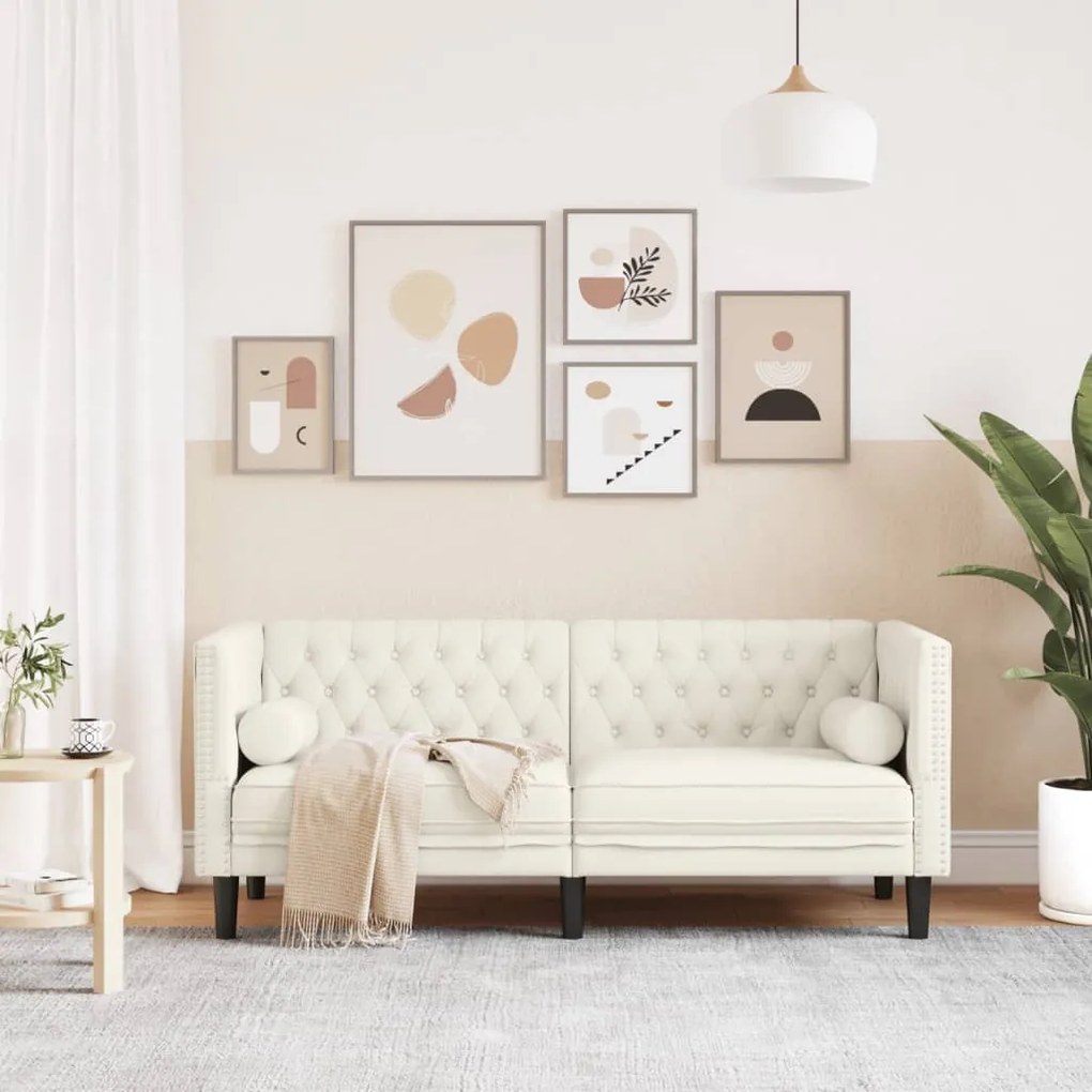 2 személyes krémszínű bársony Chesterfield kanapé párnákkal