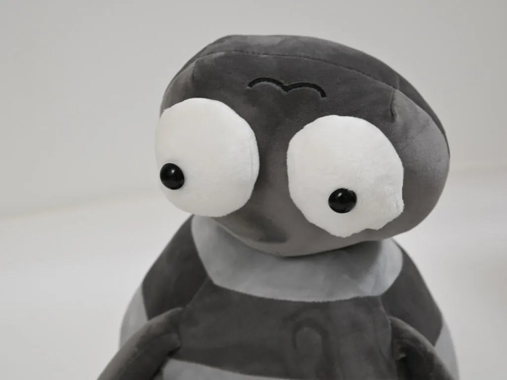 Plüss PÓK szürke babatakaróval belül