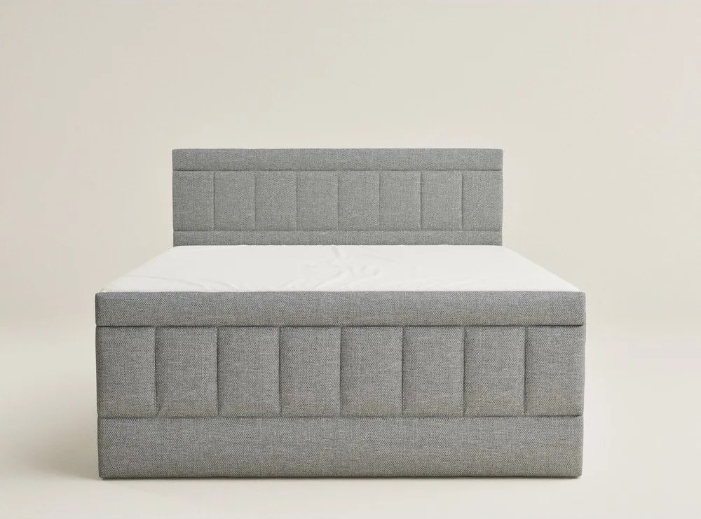 Szürke ágyneműtartós boxspring ágy 160x200 cm Caya – Maison de Rêve