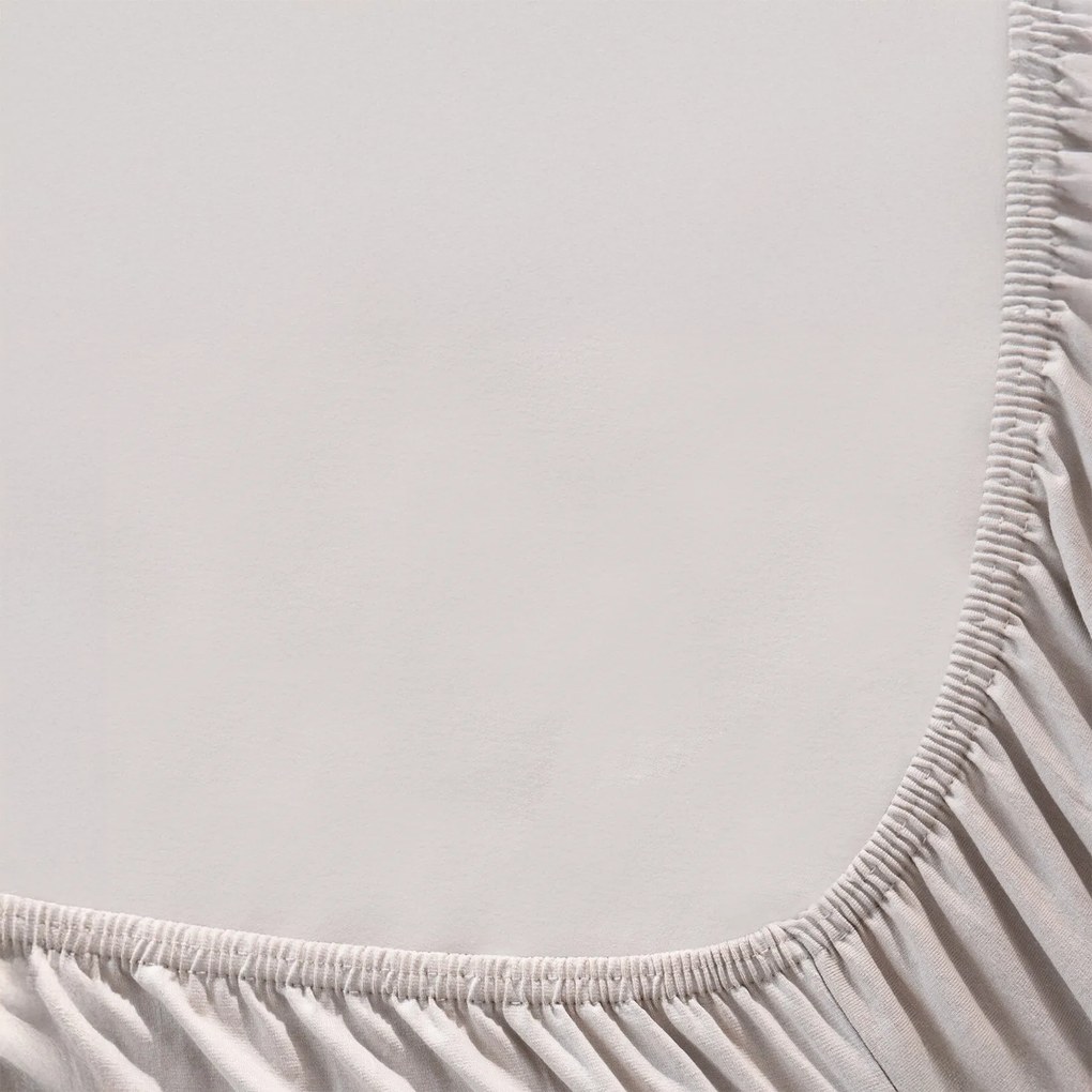 Goldea jersey gumis lepedő - szürkésbarna 180 x 200 cm