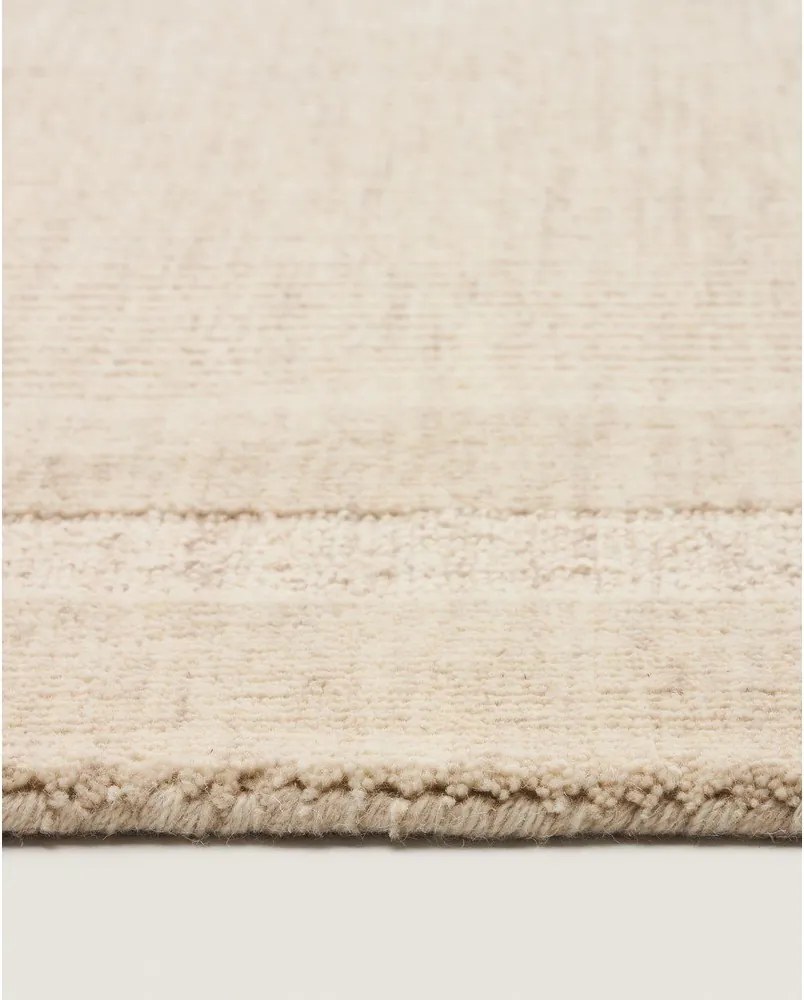 Krémszínű kézi szövésű gyapjú szőnyeg 160x230 cm Dalena – Kave Home