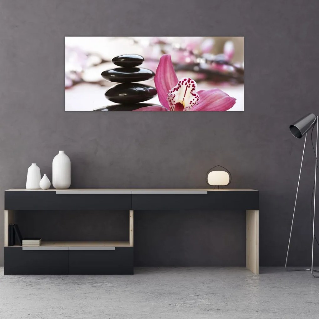 Masszázs kövek és orchideák képe (120x50 cm)