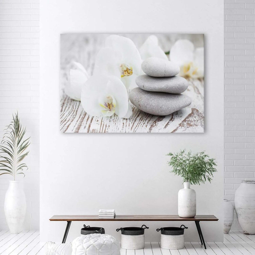 Gario Vászonkép Fehér orchidea és kövek Méret: 100 x 70 cm