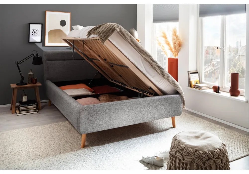 Szürke kárpitozott ágyneműtartós franciaágy ágyráccsal 140x200 cm Lotte – Meise Möbel