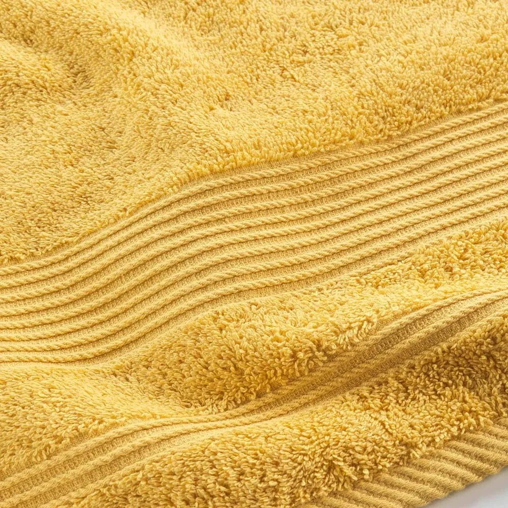 Sárga frottír pamut fürdőlepedő 70x130 cm Tendresse – douceur d'intérieur