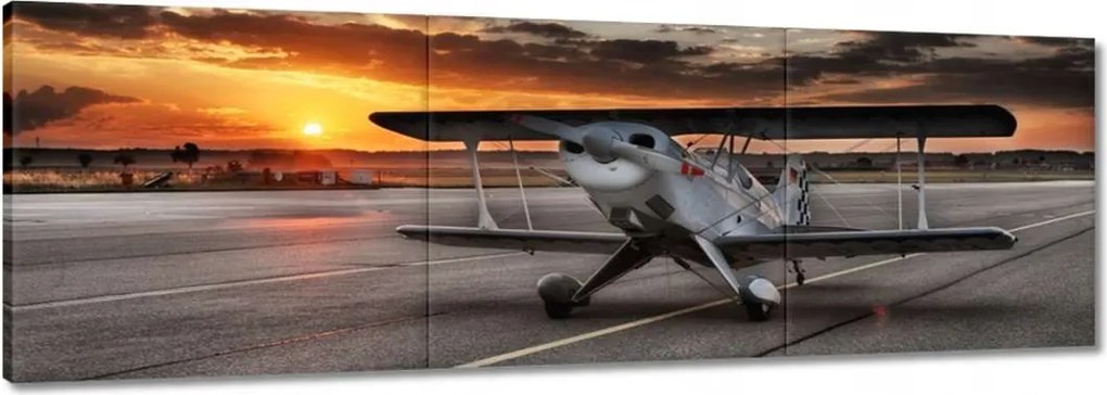 Vászonkép 60x20 Repülőgép naplemente
