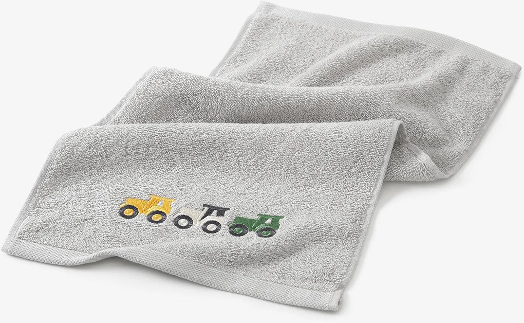 Goldea gyermek frottír törölköző - színes traktorok szürkén 30 x 50 cm
