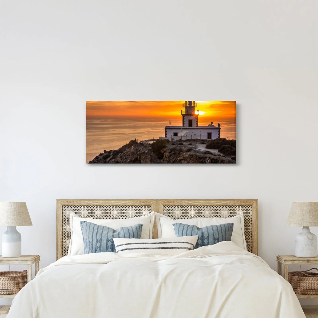 Világítótorony naplementekor képe (120x50 cm)