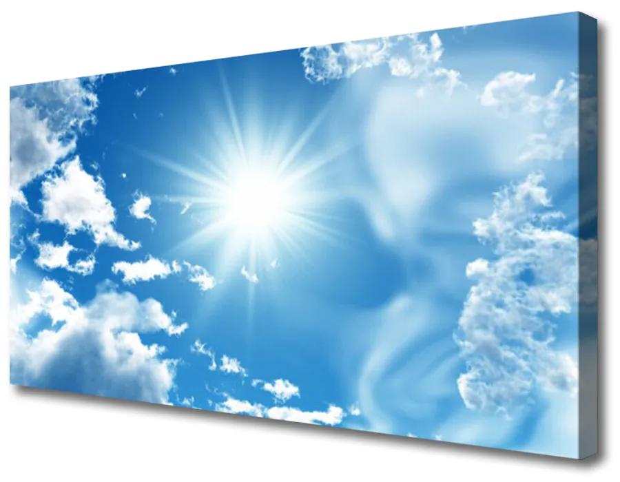 Vászonfotó Blue Sky Sun Clouds 100x50 cm