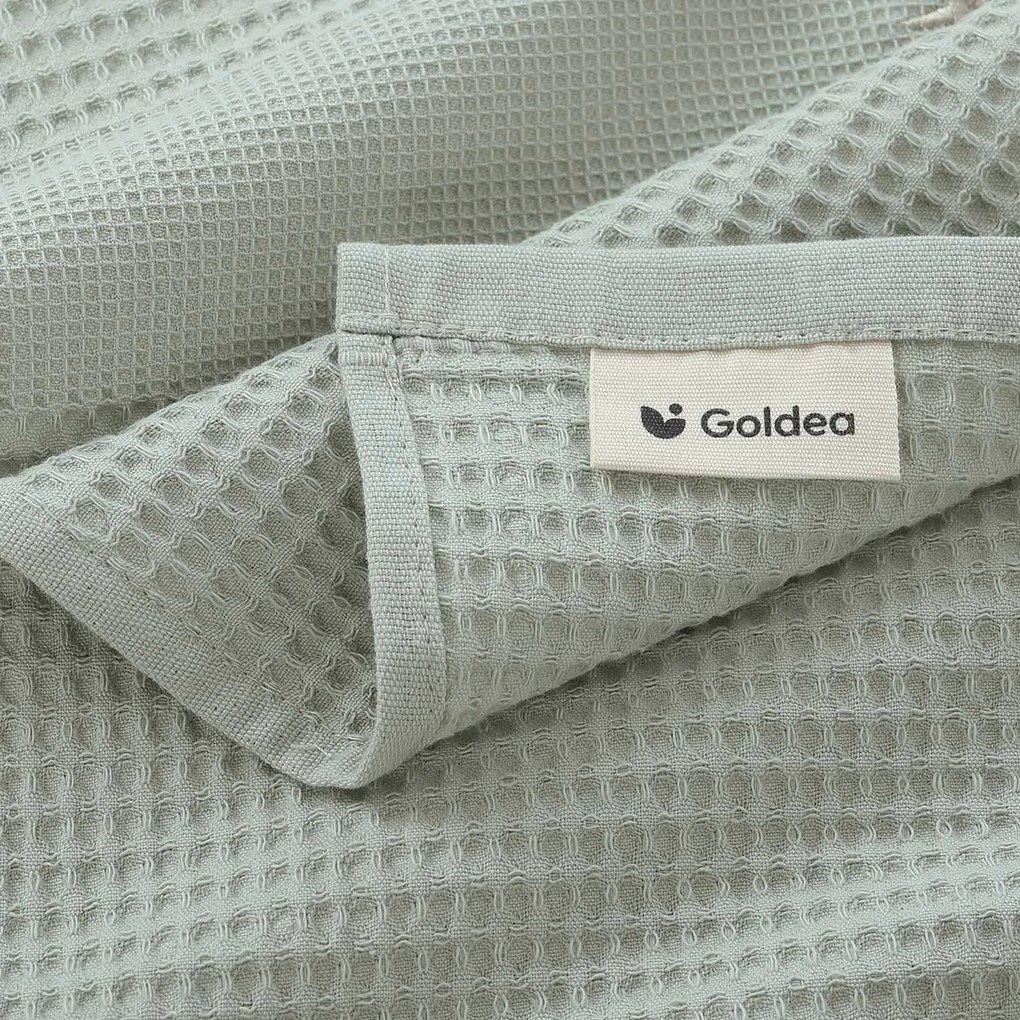 Goldea karácsonyi hímzett waffle konyharuha - gömbök az ágon zsálya háttéren 50 x 70 cm