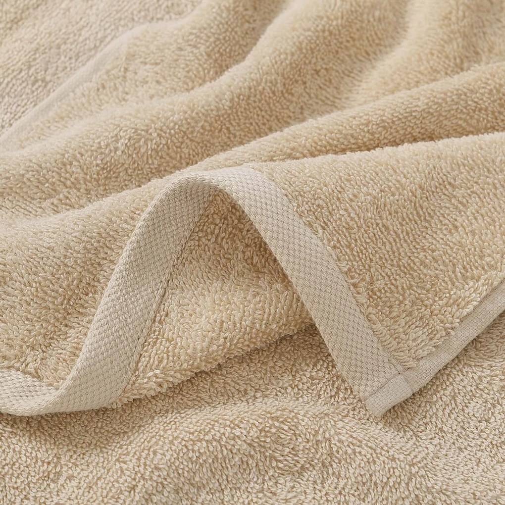 Goldea gyermek frottír törölköző - pingvin bézsen 30 x 50 cm