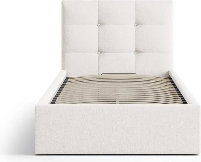 Krémszínű kárpitozott ágyneműtartós egyszemélyes ágy ágyráccsal 90x200 cm Phaedra – Micadoni