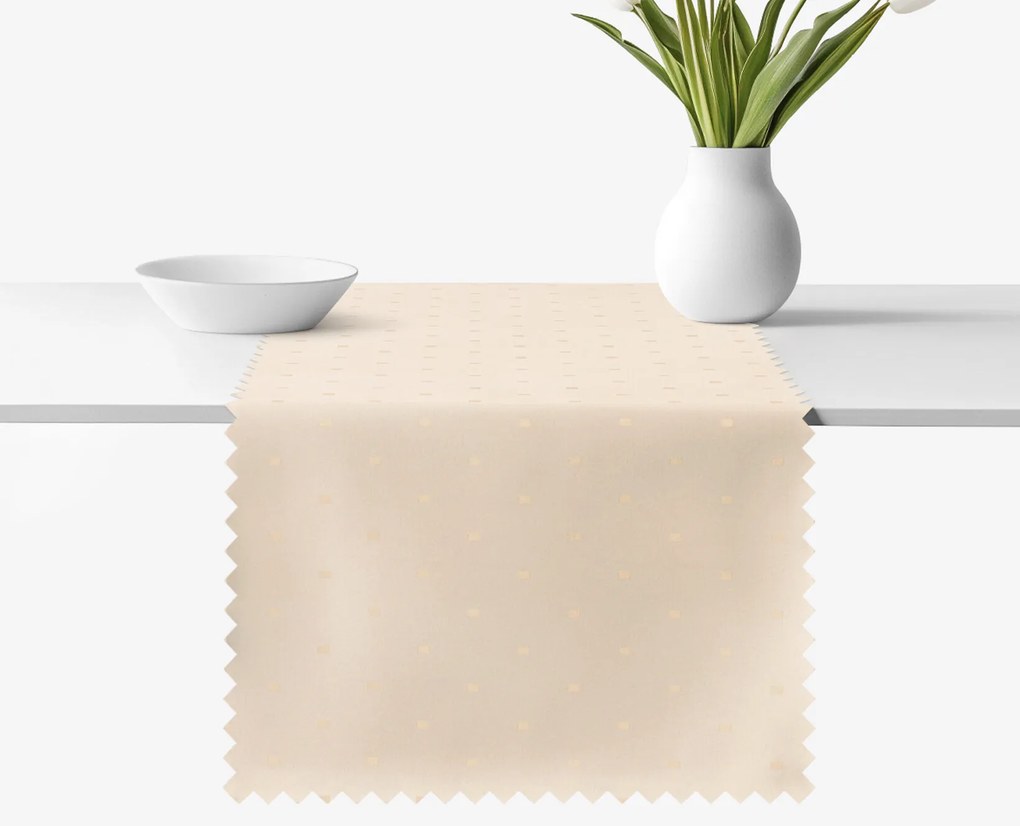 Goldea ünnepi teflonos asztali futó - pezsgő színű alapon fényes négyzetek 50x120 cm