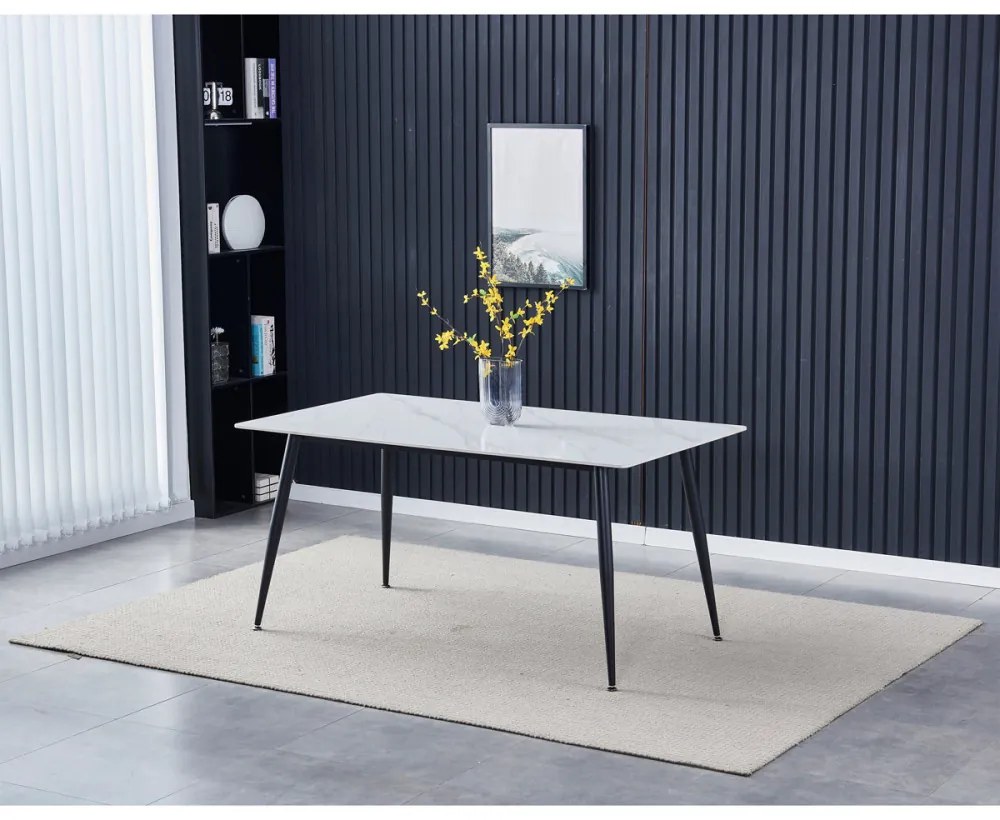 Masă albă cu efect de marmură, cu blat din ceramică, picioare din metal negru. Dimensiuni: 160x90x76 cm. HT-406